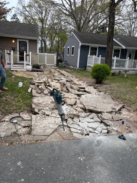 Concrete walkway demolition at a Somers Point, NJ home
