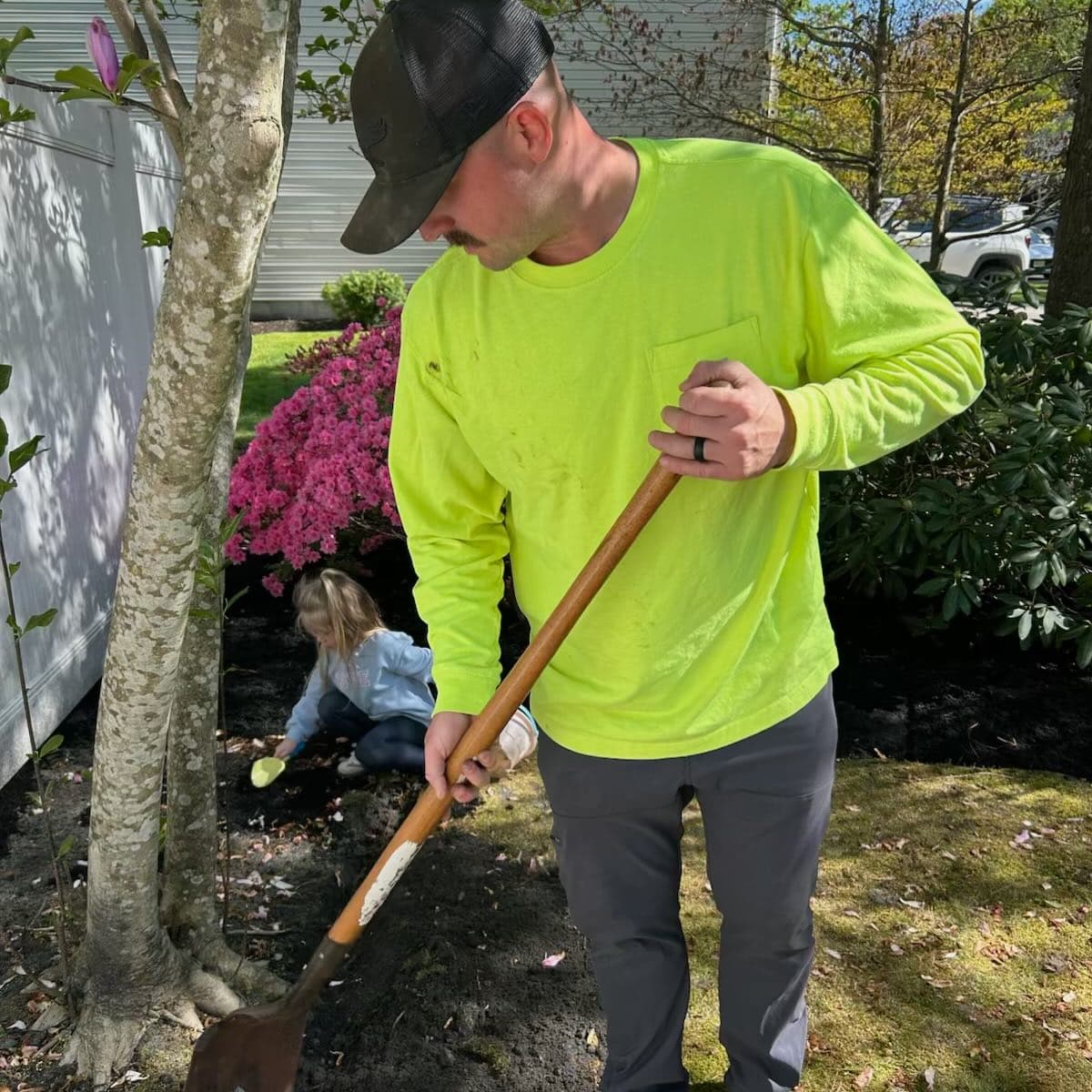 Regrading a magnolia and azalea bed at a Northfield, NJ home
